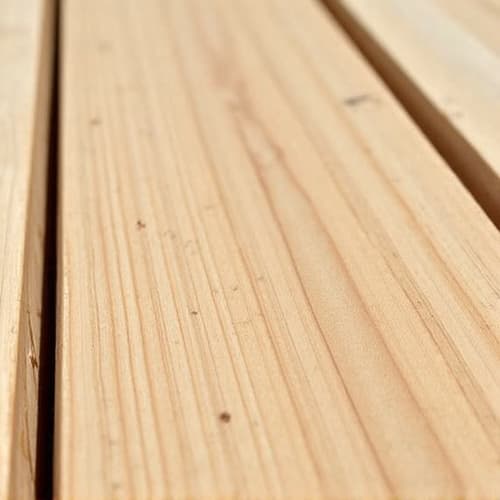 Deck sanded and prepared for transparent stain application showing clean wood grain