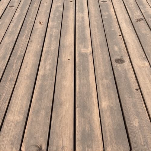 weathered deck before stripping and cleaning in Helena, AL