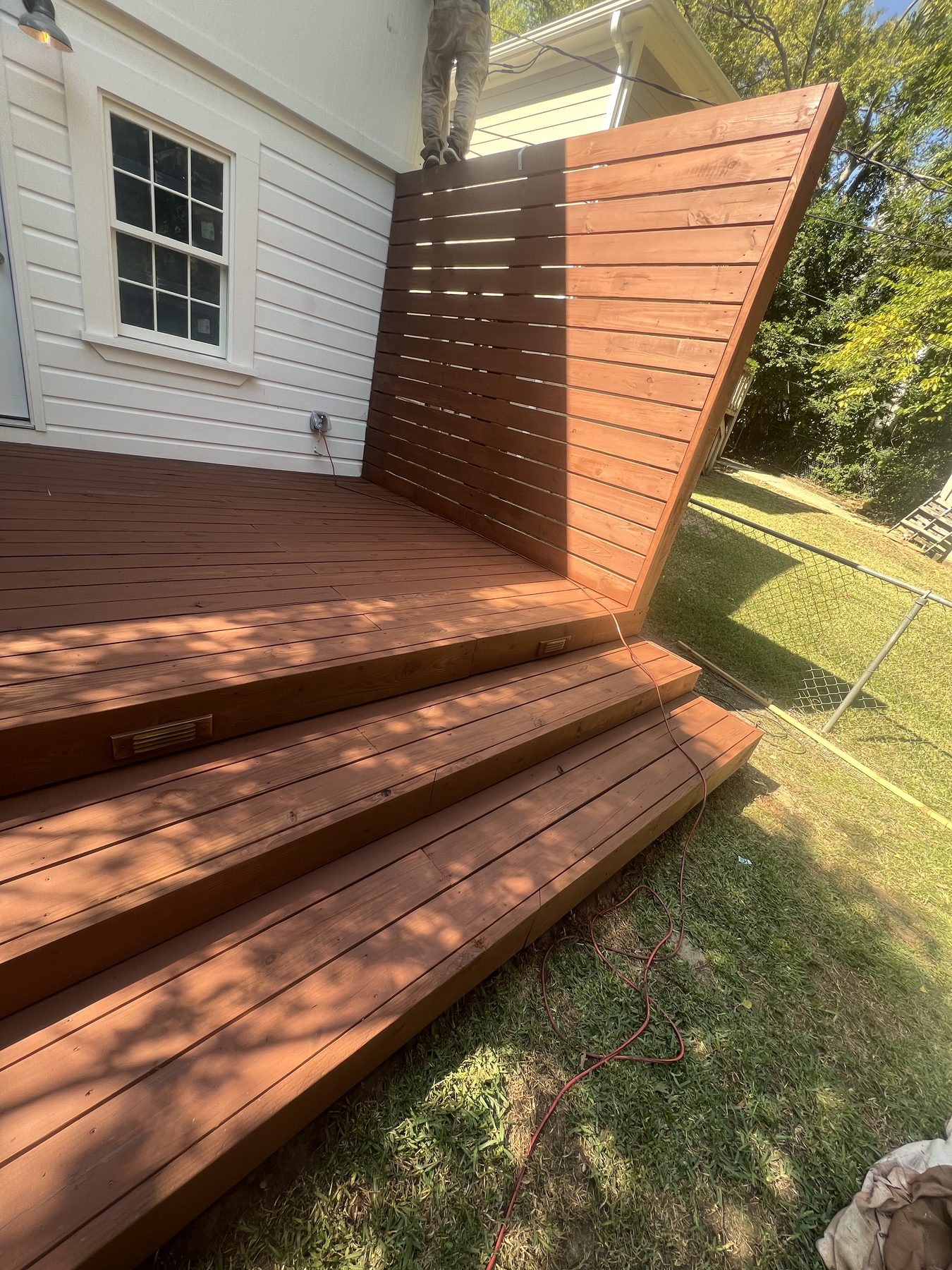 Clean and restored outdoor deck living space in Birmingham, AL